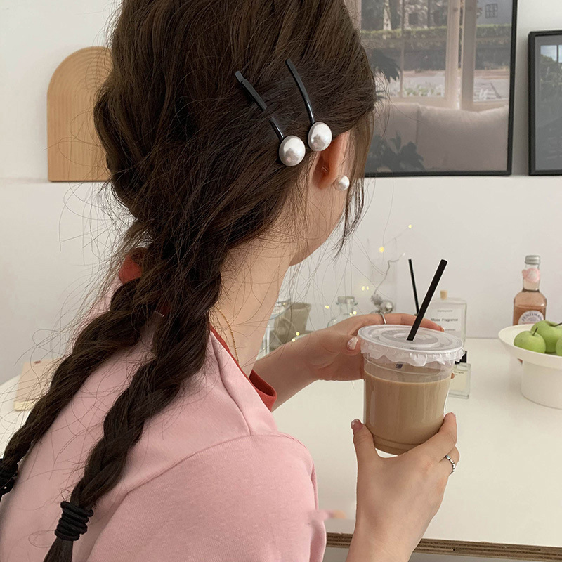 Pince à cheveux en forme de ba - Head Racket Boom avis et prix