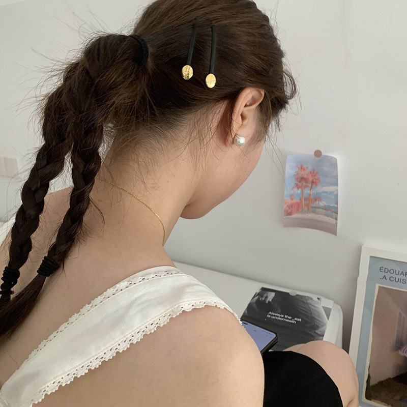 Pince à cheveux en forme de ba - Head Racket Boom avis et prix